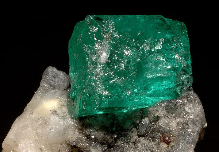 Ethiopian Emerald – Natural Rough Stones Uncut green Ethiopian emeralds in rough form, representing high-quality gemstone sourcing from Afra Sourcing